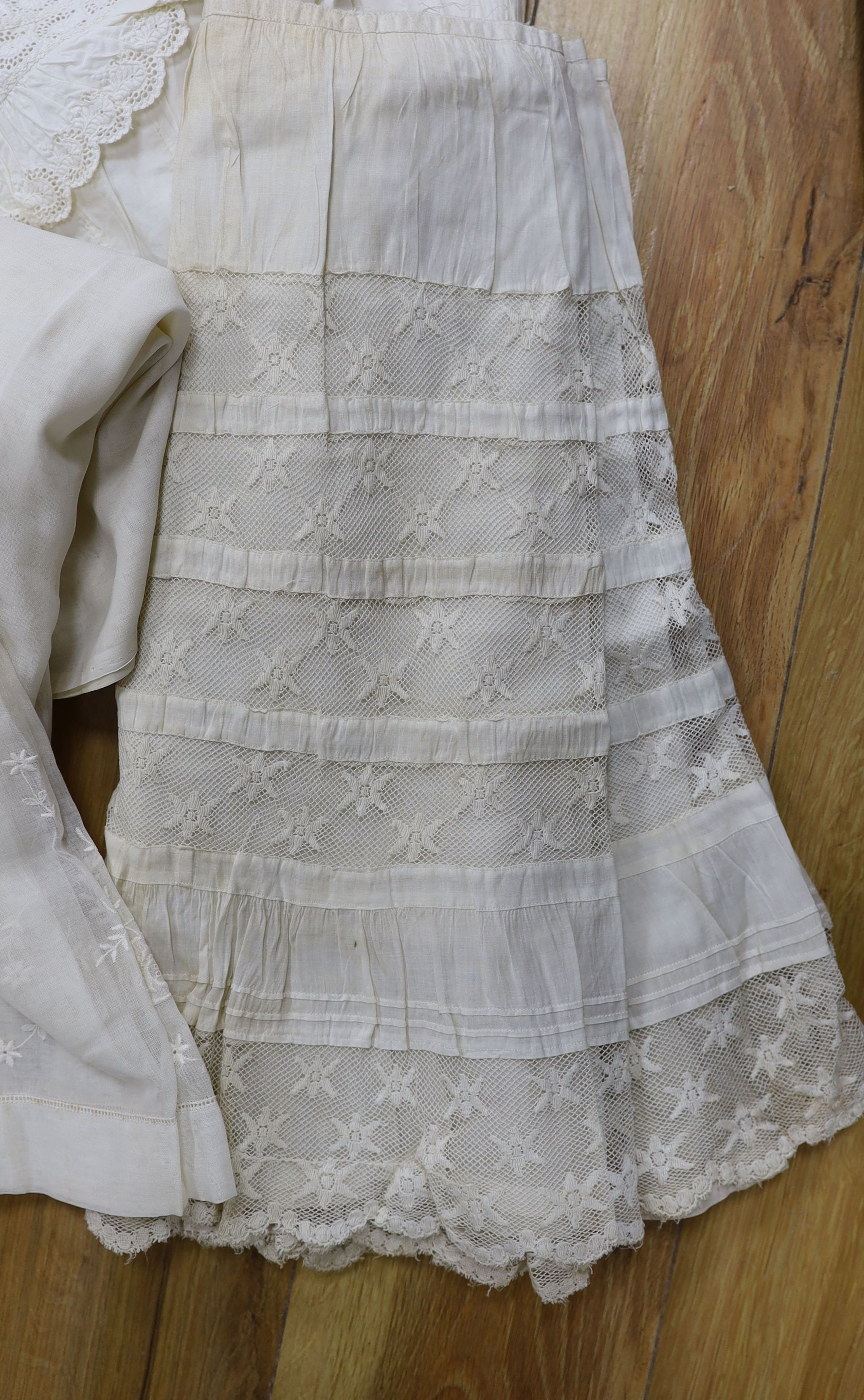 A collection of chemise/pantaloon lace inserted undergarments and a collection of petticoat flounces